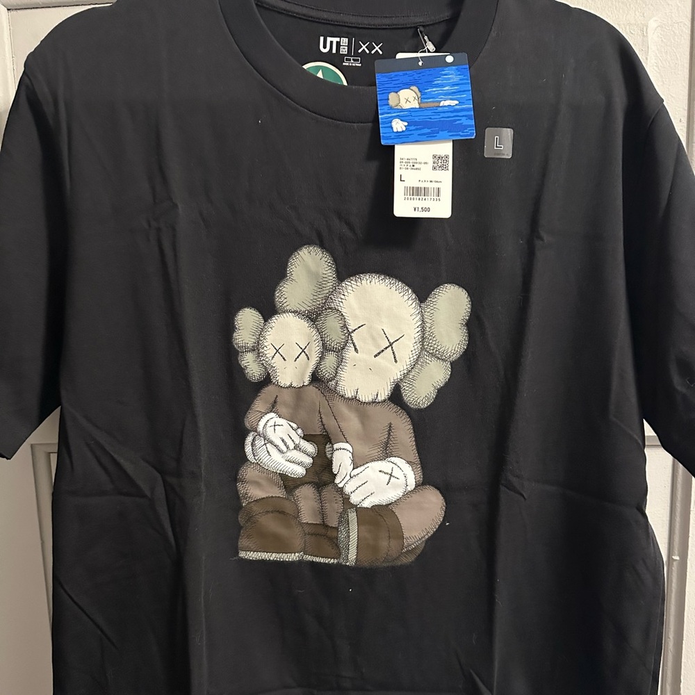 Kaws Uniqlo Black T-Shirt with Artistic Graphic